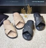 Luxury Emporio Armani slides in beige and black, showcasing Modern Luxury and Urban Edge design.
