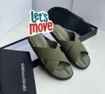 Luxury Emporio Armani slides in beige and black, showcasing Modern Luxury and Urban Edge design.