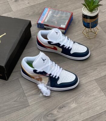 A pair of white, navy, and gold Air Jordan 1 Mid sneakers on a wooden floor, exuding Modern Luxury and Urban Edge style.