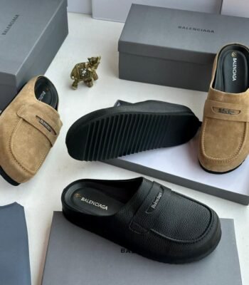 Luxury Balenciaga loafers in black and tan, showcasing Modern Luxury and Urban Edge designs, perfect for men in Nigeria.
