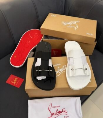 Christian Louboutin Paris sandals in black and white, displayed with luxury packaging and accessories, embodying Modern Luxury and Urban Edge.