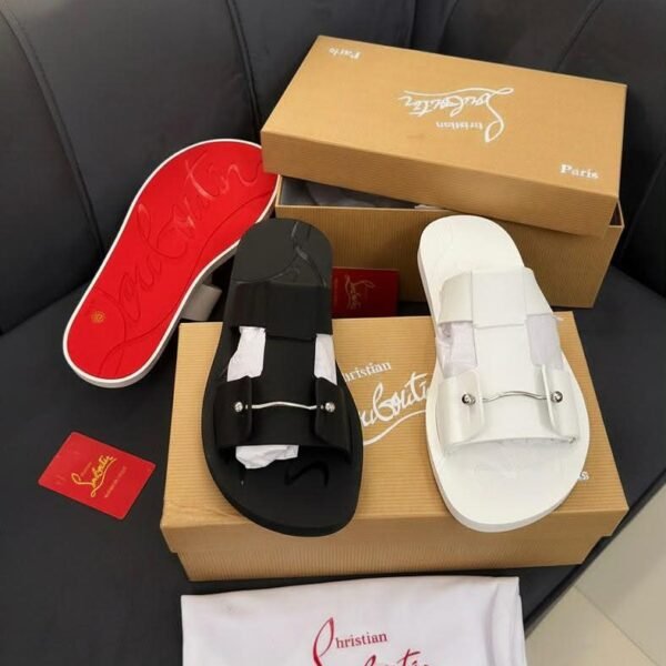 Christian Louboutin Paris sandals in black and white, displayed with luxury packaging and accessories, embodying Modern Luxury and Urban Edge.