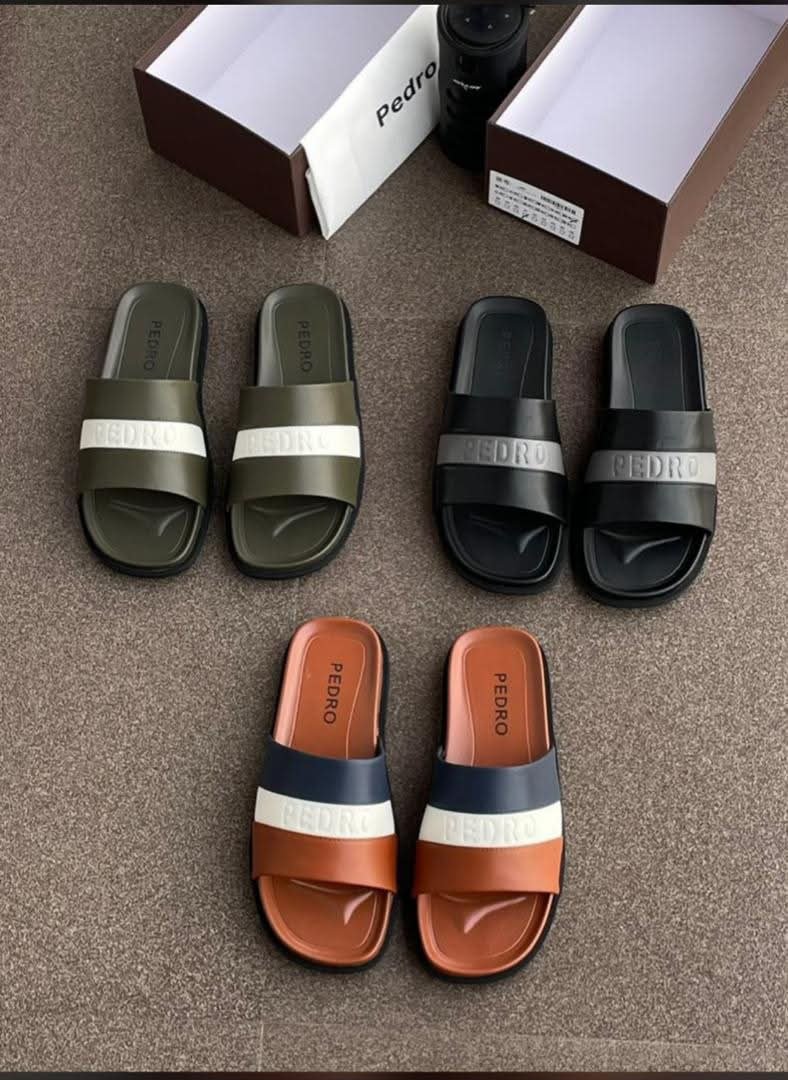 root A display of stylish Pedro slides in various colors, showcasing Modern Luxury and Urban Edge design.