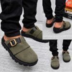A stylish pair of grey half shoes with a gold buckle, showcased from multiple angles, exuding modern luxury and urban edge.