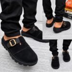 A stylish pair of grey half shoes with a gold buckle, showcased from multiple angles, exuding modern luxury and urban edge.