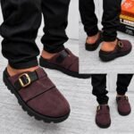 A stylish pair of grey half shoes with a gold buckle, showcased from multiple angles, exuding modern luxury and urban edge.