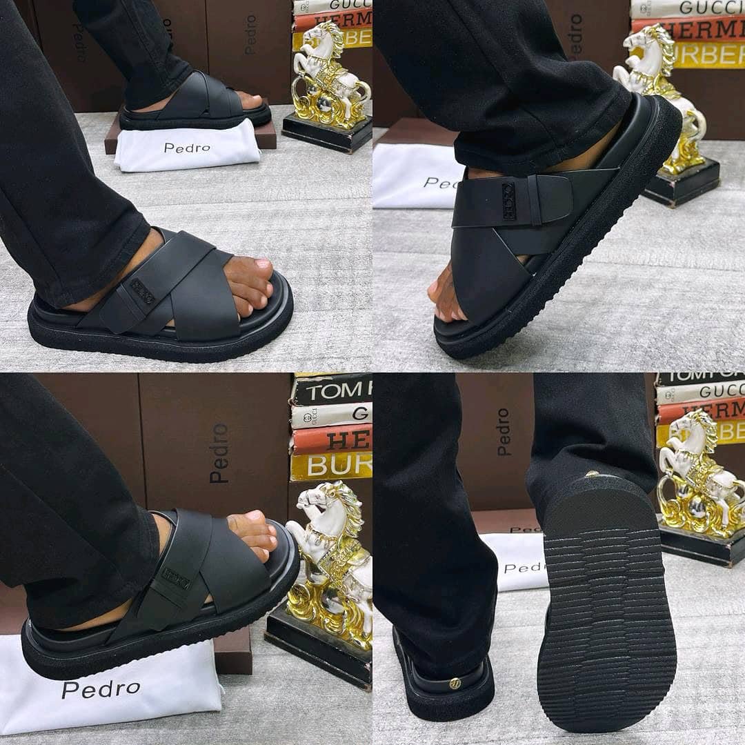 root A stylish pair of black sandals with a modern design, showcased from multiple angles, highlighting their sleek features and comfortable fit.