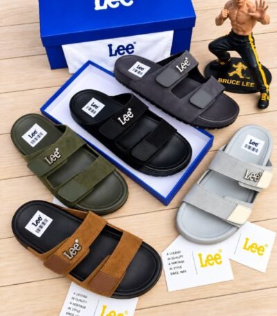 Lee Modern Luxury slides in various colors, presented with a Bruce Lee figurine and packaging, embodying Urban Edge and Timeless Quality.