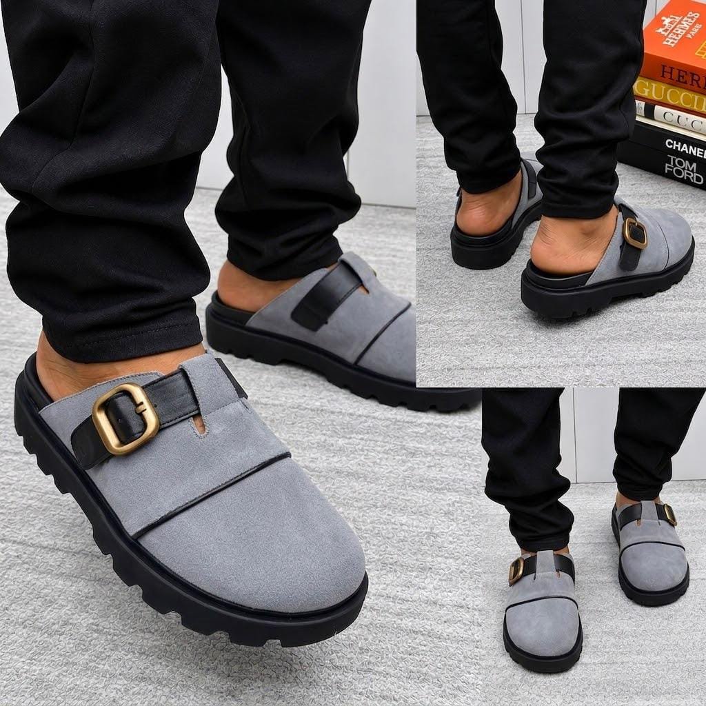 root A stylish pair of grey half shoes with a gold buckle, showcased from multiple angles, exuding modern luxury and urban edge.